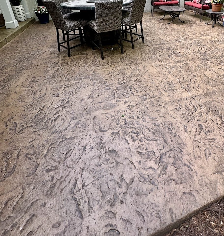 Textured stamped concrete patio slab