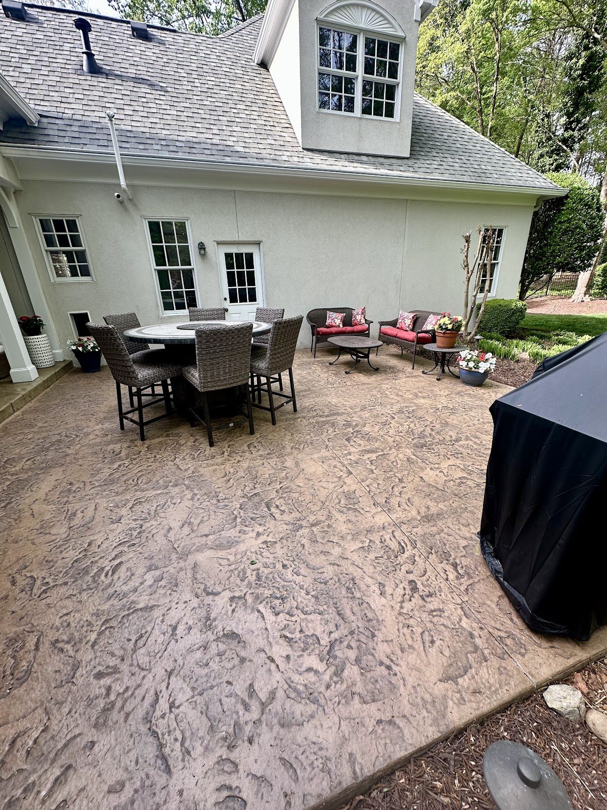 Wide textured stamped concrete patio